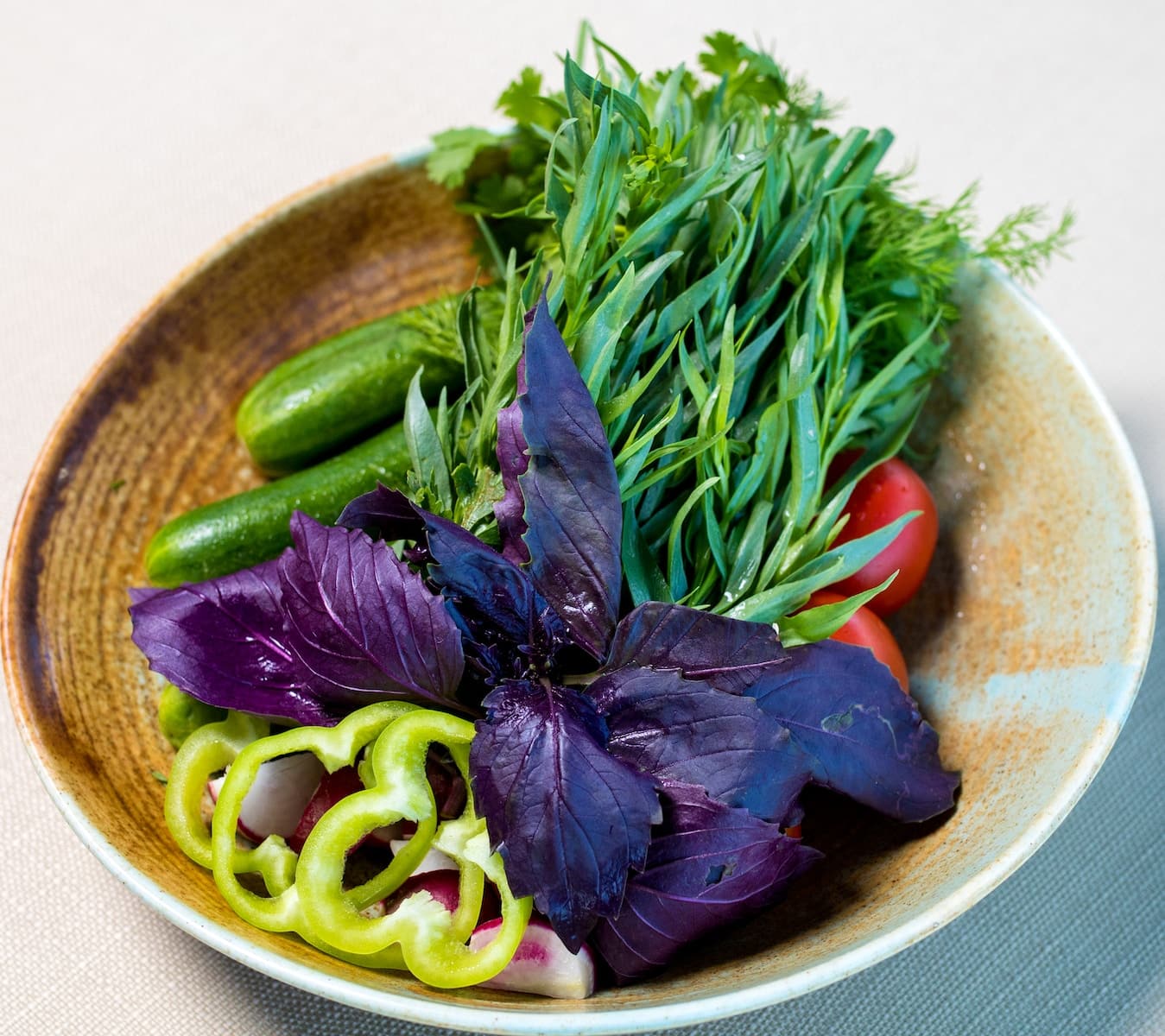 green vegetable on brown ceramic plate